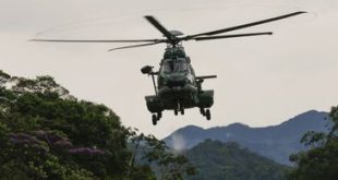 O presidente da República, Jair Bolsonaro, sobrevoa as áreas afetadas pelos temporais em Petrópolis