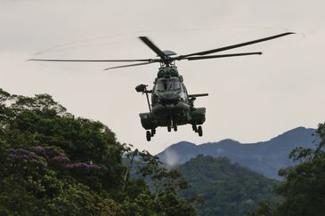 O presidente da República, Jair Bolsonaro, sobrevoa as áreas afetadas pelos temporais em Petrópolis 